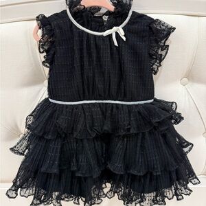 Black Ruffled Dress with White Trim
